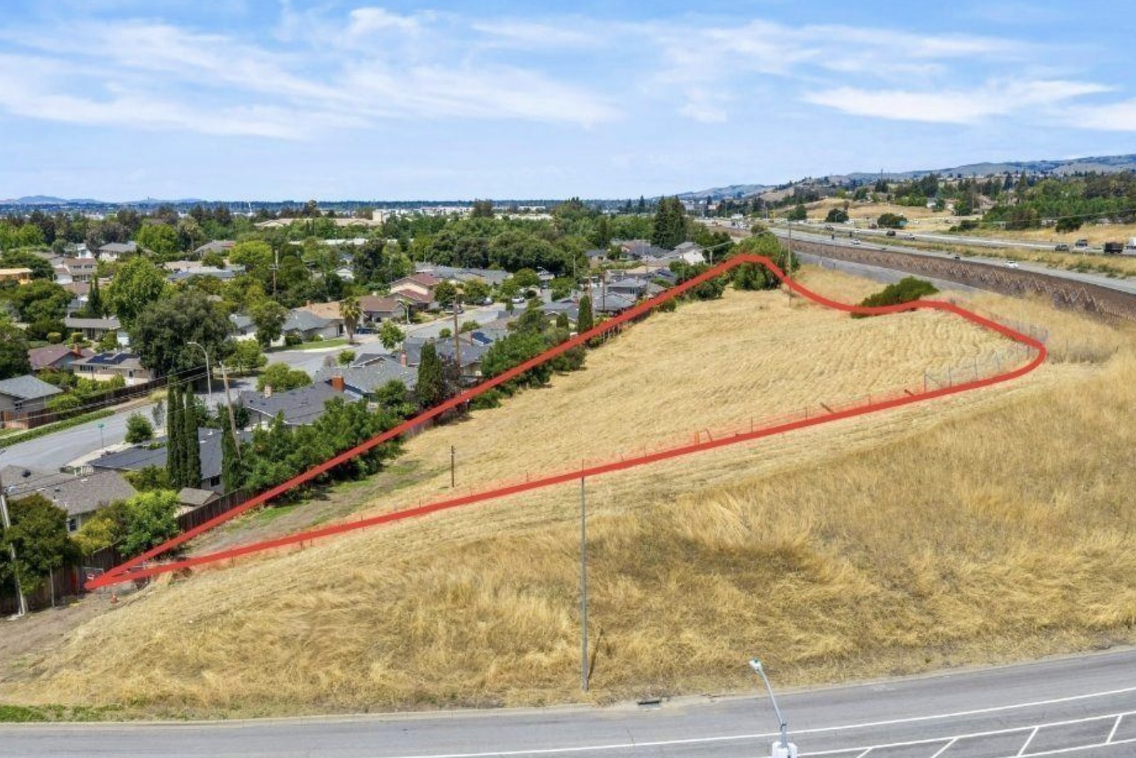 Aerial view of the Warren Place parcel outlined, E Warren Ave, Fremont